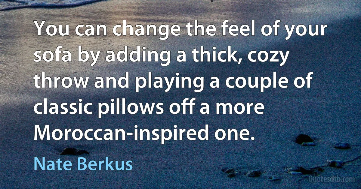 You can change the feel of your sofa by adding a thick, cozy throw and playing a couple of classic pillows off a more Moroccan-inspired one. (Nate Berkus)